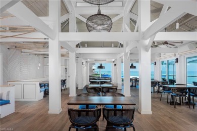 This twelth-floor residence provides the perfect elevation for on Club at Pelican Bay Golf Course in Florida - for sale on GolfHomes.com, golf home, golf lot