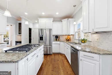 Experience luxury living at its finest with this stunning on Collins Hill Golf Club in Georgia - for sale on GolfHomes.com, golf home, golf lot