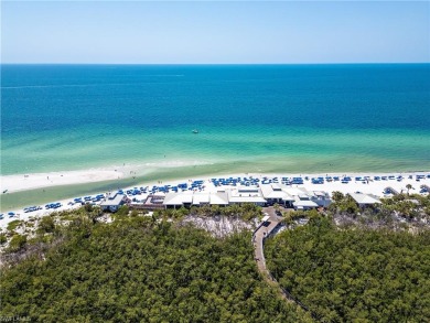 This twelth-floor residence provides the perfect elevation for on Club at Pelican Bay Golf Course in Florida - for sale on GolfHomes.com, golf home, golf lot
