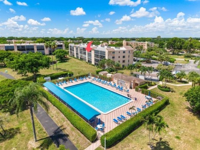 Discover this stunning 2-bed, 2-bath condo located on the third on Marina Lakes Golf Course in Florida - for sale on GolfHomes.com, golf home, golf lot