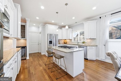 Experience luxury living at its finest with this stunning on Collins Hill Golf Club in Georgia - for sale on GolfHomes.com, golf home, golf lot