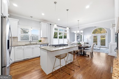 Experience luxury living at its finest with this stunning on Collins Hill Golf Club in Georgia - for sale on GolfHomes.com, golf home, golf lot