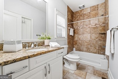 Experience luxury living at its finest with this stunning on Collins Hill Golf Club in Georgia - for sale on GolfHomes.com, golf home, golf lot