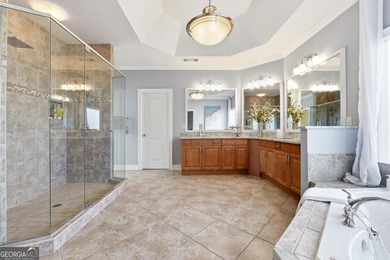 Experience luxury living at its finest with this stunning on Collins Hill Golf Club in Georgia - for sale on GolfHomes.com, golf home, golf lot