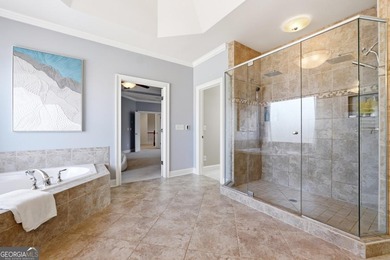 Experience luxury living at its finest with this stunning on Collins Hill Golf Club in Georgia - for sale on GolfHomes.com, golf home, golf lot