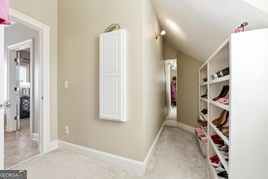 Experience luxury living at its finest with this stunning on Collins Hill Golf Club in Georgia - for sale on GolfHomes.com, golf home, golf lot