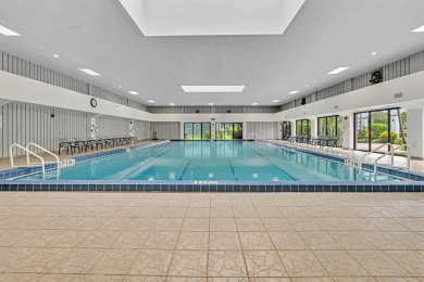 Discover this stunning 2-bed, 2-bath condo located on the third on Marina Lakes Golf Course in Florida - for sale on GolfHomes.com, golf home, golf lot
