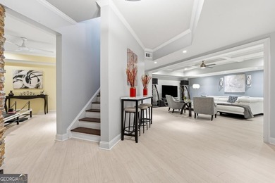 Experience luxury living at its finest with this stunning on Collins Hill Golf Club in Georgia - for sale on GolfHomes.com, golf home, golf lot