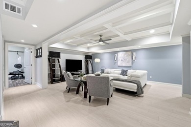 Experience luxury living at its finest with this stunning on Collins Hill Golf Club in Georgia - for sale on GolfHomes.com, golf home, golf lot