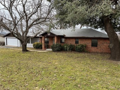 Super cute 2 bedroom, 2 bath home, with a covered patio and 2 on Harbor Lakes Golf Club in Texas - for sale on GolfHomes.com, golf home, golf lot