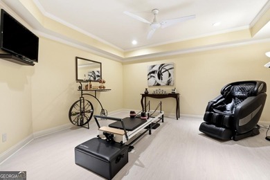 Experience luxury living at its finest with this stunning on Collins Hill Golf Club in Georgia - for sale on GolfHomes.com, golf home, golf lot