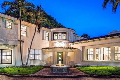 Stunning mediterranean mansion exuding elegance and beach vibes on Miami Beach Golf Club in Florida - for sale on GolfHomes.com, golf home, golf lot