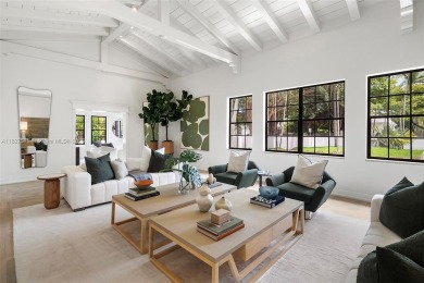 Stunning mediterranean mansion exuding elegance and beach vibes on Miami Beach Golf Club in Florida - for sale on GolfHomes.com, golf home, golf lot