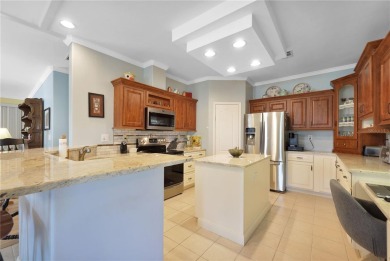 This TRIPLE-wide Palm Harbor home is situated on a spacious on Maple Leaf Golf and Country Club in Florida - for sale on GolfHomes.com, golf home, golf lot