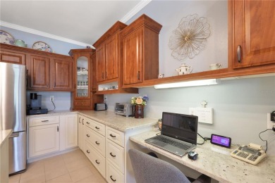 This TRIPLE-wide Palm Harbor home is situated on a spacious on Maple Leaf Golf and Country Club in Florida - for sale on GolfHomes.com, golf home, golf lot