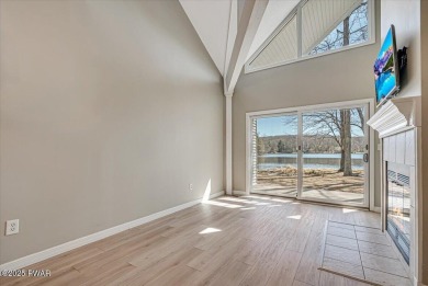 Unbeatable location nestled directly between the tranquil shores on Paupack Hills Golf and Country Club in Pennsylvania - for sale on GolfHomes.com, golf home, golf lot