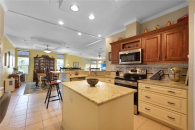 This TRIPLE-wide Palm Harbor home is situated on a spacious on Maple Leaf Golf and Country Club in Florida - for sale on GolfHomes.com, golf home, golf lot