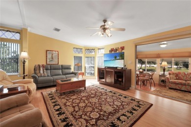 This TRIPLE-wide Palm Harbor home is situated on a spacious on Maple Leaf Golf and Country Club in Florida - for sale on GolfHomes.com, golf home, golf lot