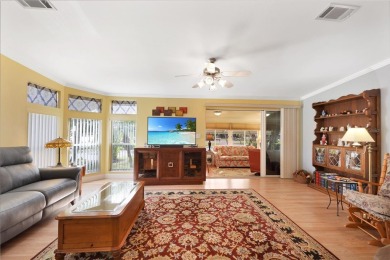 This TRIPLE-wide Palm Harbor home is situated on a spacious on Maple Leaf Golf and Country Club in Florida - for sale on GolfHomes.com, golf home, golf lot