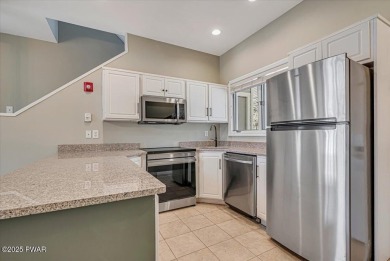 Unbeatable location nestled directly between the tranquil shores on Paupack Hills Golf and Country Club in Pennsylvania - for sale on GolfHomes.com, golf home, golf lot