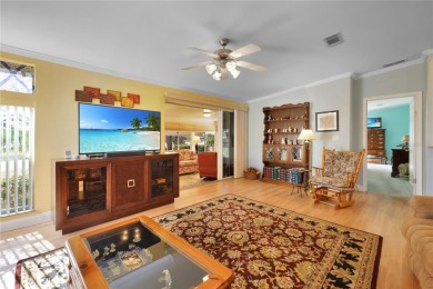 This TRIPLE-wide Palm Harbor home is situated on a spacious on Maple Leaf Golf and Country Club in Florida - for sale on GolfHomes.com, golf home, golf lot