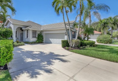 NESTLED IN THE EXCLUSIVE 24/7 DOUBLE-GATED PRIVATE COMMUNITY OF on PGA National Golf Club in Florida - for sale on GolfHomes.com, golf home, golf lot