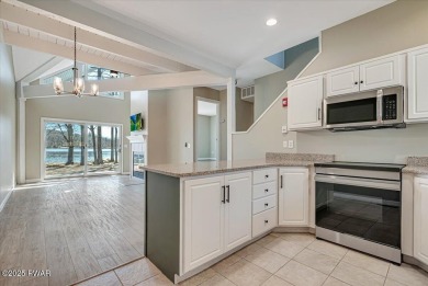 Unbeatable location nestled directly between the tranquil shores on Paupack Hills Golf and Country Club in Pennsylvania - for sale on GolfHomes.com, golf home, golf lot