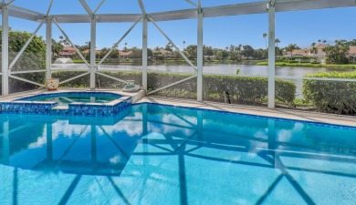 NESTLED IN THE EXCLUSIVE 24/7 DOUBLE-GATED PRIVATE COMMUNITY OF on PGA National Golf Club in Florida - for sale on GolfHomes.com, golf home, golf lot