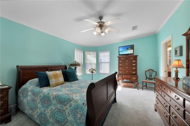 This TRIPLE-wide Palm Harbor home is situated on a spacious on Maple Leaf Golf and Country Club in Florida - for sale on GolfHomes.com, golf home, golf lot