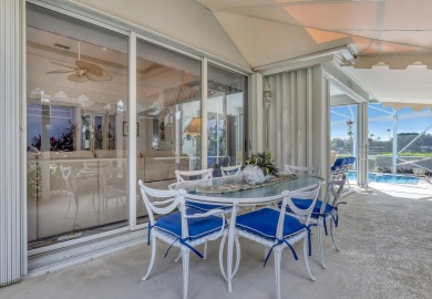 NESTLED IN THE EXCLUSIVE 24/7 DOUBLE-GATED PRIVATE COMMUNITY OF on PGA National Golf Club in Florida - for sale on GolfHomes.com, golf home, golf lot
