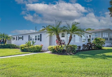 This lovely home has custom updates throughout that give it a on Riviera Golf Club in Florida - for sale on GolfHomes.com, golf home, golf lot