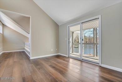 Unbeatable location nestled directly between the tranquil shores on Paupack Hills Golf and Country Club in Pennsylvania - for sale on GolfHomes.com, golf home, golf lot