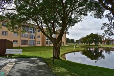 Experience the best of tropical Florida living in this charming on Sunrise Lakes Phase III in Florida - for sale on GolfHomes.com, golf home, golf lot