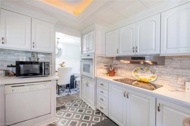 This lovely home has custom updates throughout that give it a on Riviera Golf Club in Florida - for sale on GolfHomes.com, golf home, golf lot