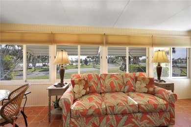 This TRIPLE-wide Palm Harbor home is situated on a spacious on Maple Leaf Golf and Country Club in Florida - for sale on GolfHomes.com, golf home, golf lot