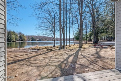Unbeatable location nestled directly between the tranquil shores on Paupack Hills Golf and Country Club in Pennsylvania - for sale on GolfHomes.com, golf home, golf lot
