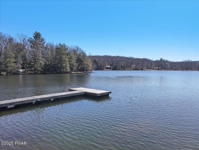 Unbeatable location nestled directly between the tranquil shores on Paupack Hills Golf and Country Club in Pennsylvania - for sale on GolfHomes.com, golf home, golf lot