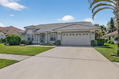 Contemporary and move in ready, recently renovated open kitchen on Boca Greens Country Club in Florida - for sale on GolfHomes.com, golf home, golf lot