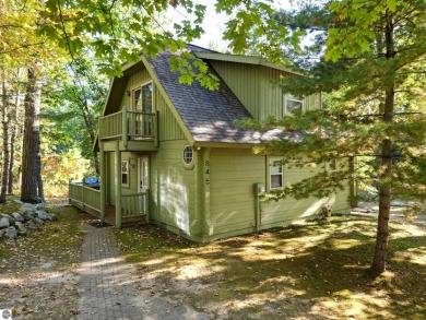 This charming cottage-style property at Garland Lodge and Golf on Garland Resort and Golf Club  in Michigan - for sale on GolfHomes.com, golf home, golf lot