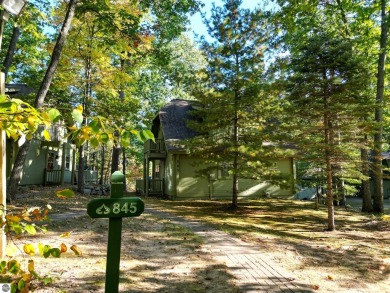 This charming cottage-style property at Garland Lodge and Golf on Garland Resort and Golf Club  in Michigan - for sale on GolfHomes.com, golf home, golf lot