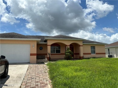 Price Reduced. Welcome to this beautiful 3-bedroom, 2-bath home on Mirror Lakes Golf Club in Florida - for sale on GolfHomes.com, golf home, golf lot