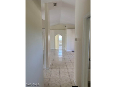 Price Reduced. Welcome to this beautiful 3-bedroom, 2-bath home on Mirror Lakes Golf Club in Florida - for sale on GolfHomes.com, golf home, golf lot
