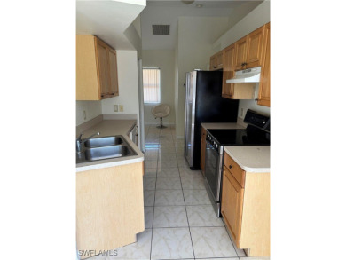 Price Reduced. Welcome to this beautiful 3-bedroom, 2-bath home on Mirror Lakes Golf Club in Florida - for sale on GolfHomes.com, golf home, golf lot