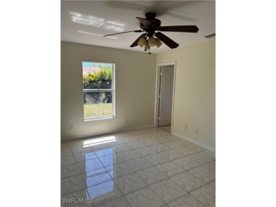Price Reduced. Welcome to this beautiful 3-bedroom, 2-bath home on Mirror Lakes Golf Club in Florida - for sale on GolfHomes.com, golf home, golf lot