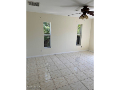 Price Reduced. Welcome to this beautiful 3-bedroom, 2-bath home on Mirror Lakes Golf Club in Florida - for sale on GolfHomes.com, golf home, golf lot
