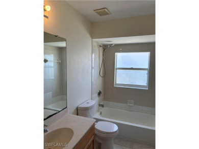 Price Reduced. Welcome to this beautiful 3-bedroom, 2-bath home on Mirror Lakes Golf Club in Florida - for sale on GolfHomes.com, golf home, golf lot