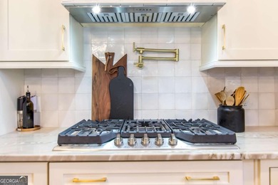 Rare Opportunity: This home offers an assumable 2.5% loan for on Towne Lake Hills Golf Club in Georgia - for sale on GolfHomes.com, golf home, golf lot