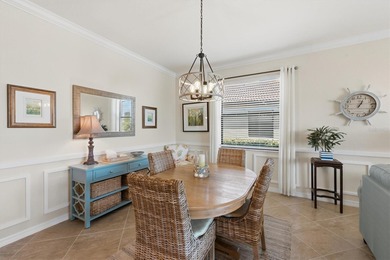 Welcome to your dream retreat at 10475 Medjool Drive in the on Sarasota National Golf Club in Florida - for sale on GolfHomes.com, golf home, golf lot