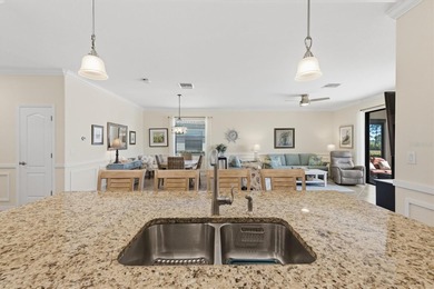 Welcome to your dream retreat at 10475 Medjool Drive in the on Sarasota National Golf Club in Florida - for sale on GolfHomes.com, golf home, golf lot