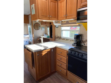 2005 Open Road RV- compliant to stay in ORPS. Lot 1066 sits a on Outdoor Resorts/Palm Springs in California - for sale on GolfHomes.com, golf home, golf lot